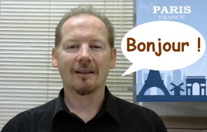 French instructor teaching a class online.